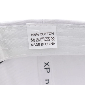 Detail of 100% cotton washing label and inner stitching on the baseball cap