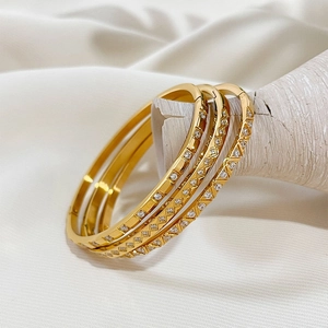 Three-piece gold plated stainless steel bangles set with micro-pave white zircon stones