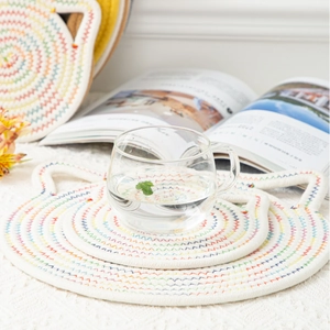 Cat-shaped woven cotton heat insulation pads in cream white with rainbow stitching