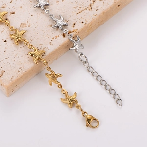 Elegant gold and silver starfish bracelets on stone base with high quality finish