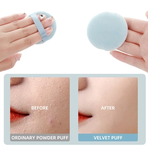 Light blue velvet powder puff with ribbon handle showing smooth application before and after