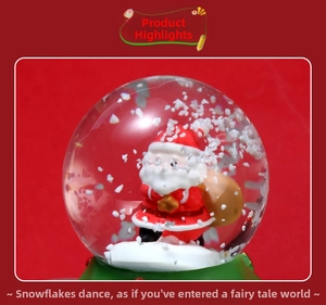 Macro detail of Christmas snow globe featuring Santa Claus and falling white snowflakes