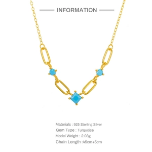 Detailed macro view of S925 sterling silver gold necklace with turquoise moon pendant