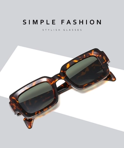 Close-up of stylish retro tortoise shell rectangular sunglasses with high-quality texture