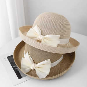 Franse stijl strohoeden in beige en bruin met grote witte chiffon strikken voor dames