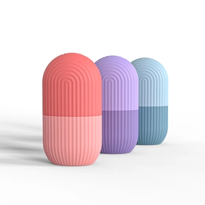 Silicone face ice mold rollers in pink, purple and blue for refreshing facial massage