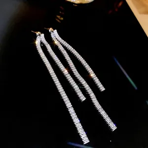 Elegant silver long tassel earrings featuring layered rectangular cubic zirconia stones