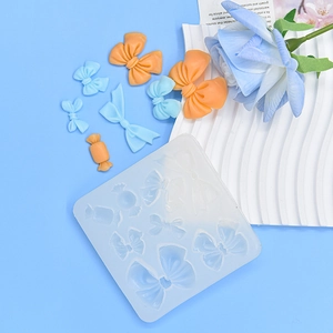 Bow and candy shaped silicone fondant mold for DIY cake decoration and clay crafting