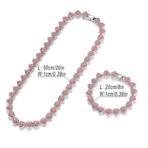 Detail showing 10mm silver cuban chain set with pink heart rhinestones and size specs