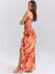 Slim fit maxi dress with abstract swirl print, ruffled edges and side lace-up detailing