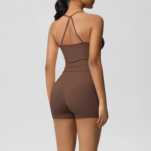Close-up of coffee brown cross-back sports bra and high-waist fitness shorts set