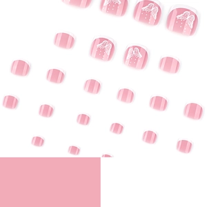 Pink French pedicure press-on toe nails with white butterfly patterns and dots
