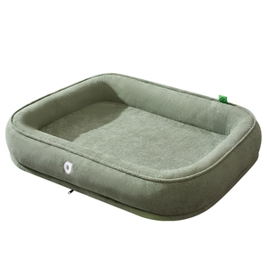 Washable rectangle pet bed in sage green plush fabric with thick cushioned bolsters