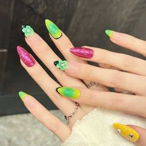 Handmade press-on nails with 3D colorful glaze flowers and rhinestone accents in long stiletto shape