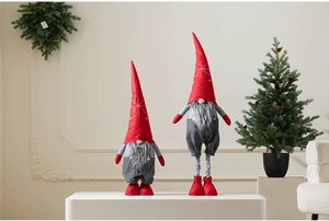 Pair of Christmas gnomes with telescopic legs and pointed red hats for home holiday decor