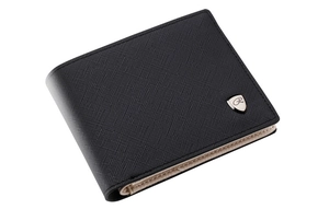 Close-up of a men's black textured leather wallet with a metallic shield logo
