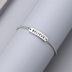 Silver stainless steel bead chain bracelet featuring a rectangular Believe engraving plate