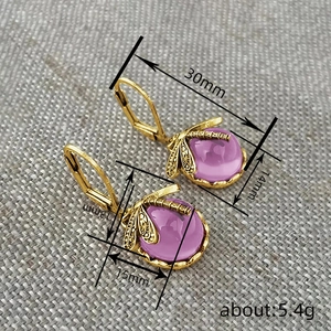 Vintage-Libellen-Ohrringe mit lila runden Steinen und Gold-Details für Damen