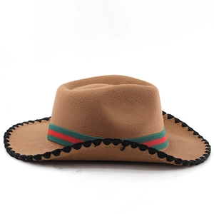 Detail of brown wool fedora featuring red and green striped band and wavy stitched brim