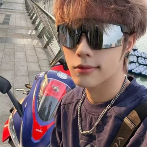 Outdoor photo of black oversized cycling sunglasses with a trendy wrap-around frame design