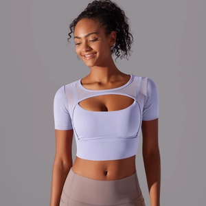 Detail of lavender yoga top featuring a unique oval cutout and slim fit athletic design