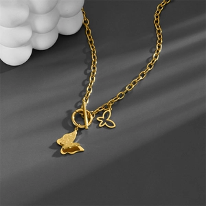 Layered gold titanium steel necklace featuring OT toggle and 3D butterfly pendants
