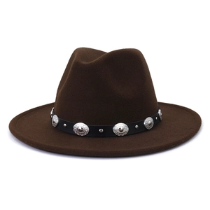 Detail of dark brown wool fedora hat featuring a black belt with silver metal studs