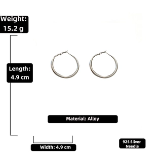 Detail showing 4.9cm large silver hoop earrings with 925 silver needles and 15.2g weight