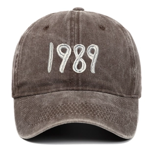 Close-up of vintage washed cotton baseball cap featuring 3D embroidered 1989 text detail