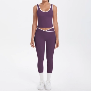 Detail view of purple yoga set featuring crisscross high waist and white contrast binding