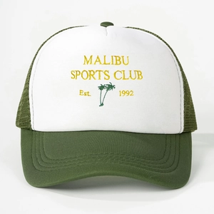 Close-up of Malibu Sports Club embroidery on the white and green mesh trucker hat