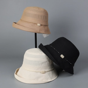 Detailed trio of woven sun hats with pearl embellishments in beige, black and camel