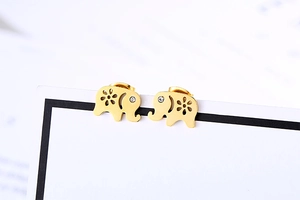 Detailed view of gold elephant stud earrings featuring hollow flower design and rhinestones