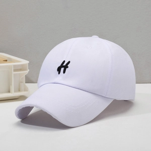 White cotton baseball cap with embroidered H letter and adjustable curved brim design
