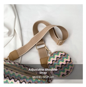 Detail of adjustable textile strap and bohemian woven texture on the crossbody bag