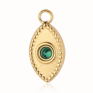 Detail of golden stainless steel evil eye pendant with green malachite stone inlay