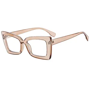 Chic square tea-colored sunglasses with transparent amber frames on a white background