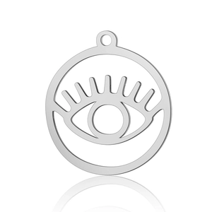 Detailed macro view of silver stainless steel evil eye pendant with cutout lashes design