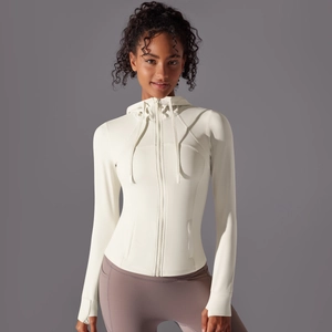 Detail view of cream white hooded sports jacket with thumb holes and slim fit seams