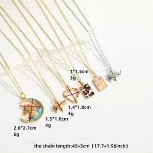 Various cute gold and silver crescent and animal pendant necklaces with size labels