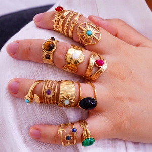 Vintage 14k gold plated stainless steel rings with colorful gemstones on model hands