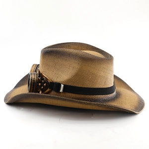 Macro view of brown straw cowboy hat featuring steampunk goggles and bronze rivets