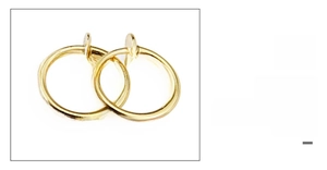 Macro view of gold stainless steel spring clip earrings with polished finish for non-pierced ears