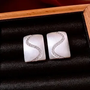 18K plated silver rectangular earrings featuring S-curve pavé set zircon stones