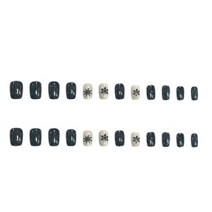 Short square press-on nails set with navy glitter and white snowflake patterns, 24 pieces