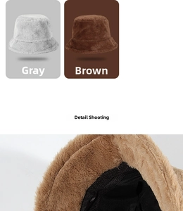 Detail view of plush faux rabbit fur bucket hat with soft lining in grey and brown colors
