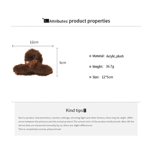 Detail view of brown plush hair claw clip with heart leopard print and sizing data