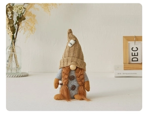 Charming female coffee gnome figure with brown knitted hat and orange braids decoration