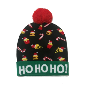 Black knitted Christmas beanie with LED lights, green cuff, and colorful candy cane patterns
