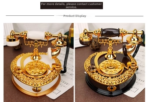 Close-up of vintage telephone music box with rose relief and gold dial details